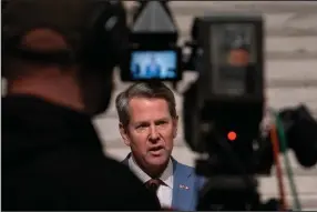  ?? (AP/Ben Gray) ?? Georgia Gov. Brian Kemp, shown last week during a news conference at the state Capitol in Atlanta, has seen Democrats gain strength in the state even as supporters of President Donald Trump work to recruit a candidate to challenge Kemp in next year’s Republican primary.