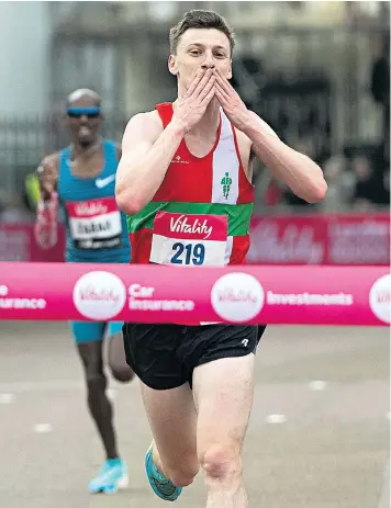  ?? ?? Ellis Cross winning the Vitality London 10,000m race yesterday ahead of Mo Farah. Left, outside his running shop