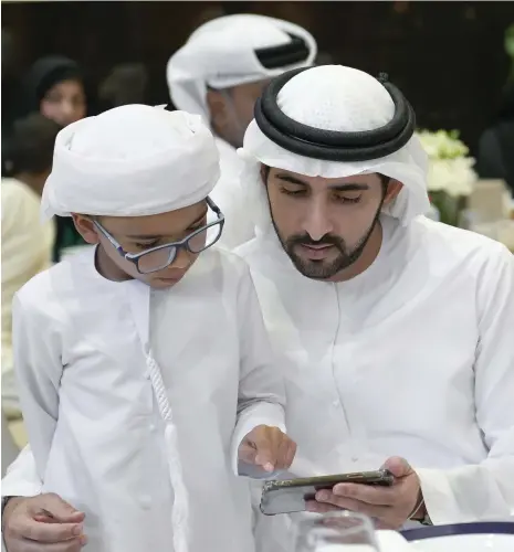  ?? Wam ?? Sheikh Hamdan bin Mohammed, Crown Prince of Dubai, during the iftar banquet with children on the autism spectrum