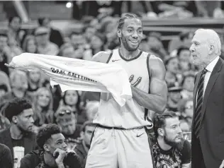  ?? Edward A. Ornelas / San Antonio Express-News ?? Kawhi Leonard played in just nine games this season because of a quadriceps injury. His reticence, along with the Spurs, have led many to question if Leonard will stay in San Antonio.