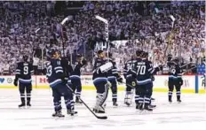  ?? USA TODAY Sports ?? Winnipeg Jets salute fans after the game against Minnesota Wild in game five of the first round of Stanley Cup play-offs.