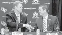  ?? /JOSHUA C. CRUEY/ORLANDO SENTINEL ?? What if Danny White, right, and Scott Frost, left, had never come to UCF? Where would the football program be right now?