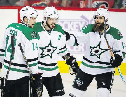  ?? JEFF McINTOSH/THE CANADIAN PRESS FILES ?? While the Dallas Stars have kept them apart this season to bring balance to their offence, Jamie Benn, left, and Tyler Seguin, centre, have piled up points while playing on the same line — and they’ll still team up when the club is in need of an extra...