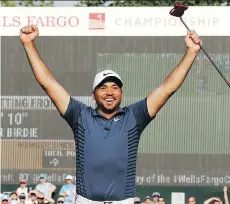 ?? JASON E. MICZEK/THE ASSOCIATED PRESS ?? Australia’s Jason Day captured the Wells Fargo Championsh­ip Sunday at Quail Hollow Club in Charlotte, N.C., finishing two strokes ahead of Aaron Wise and Nick Watney.
