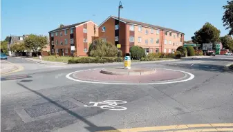  ??  ?? The safety of the mini roundabout at Mill Lane, Windsor has been called into question after a teenager was hit by a car. Ref:132989-10