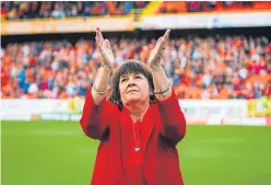  ?? Picture: Steve MacDougall. ?? Amanda Kopel, widow of Frank Kopel, applauds Dundee United fans at Tannadice.