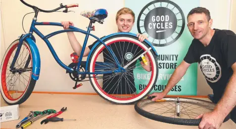  ?? Picture: GLENN FERGUSON ?? WHEEL DEAL: Michael Marshall and Donovan Roberts at the Good Cycles bike hub in the Centrepoin­t Arcade.