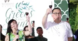  ??  ?? A TOAST. Honoring 2017 top clients, Waterfront's Antoniette Elmido &amp; Bryan Yves Lasalas