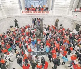  ?? Bill Pugliano Getty Images ?? AT THE CAPITOL in Frankfort, Ky., teachers and their supporters rally against a pension reform measure passed by the Republican Legislatur­e last week.