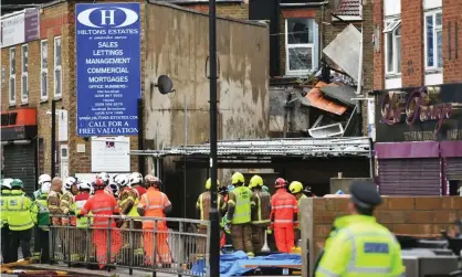  ??  ?? The scene of a suspected gas explosion on King Street in Ealing, west London. Photograph: Dominic Lipinski/PA