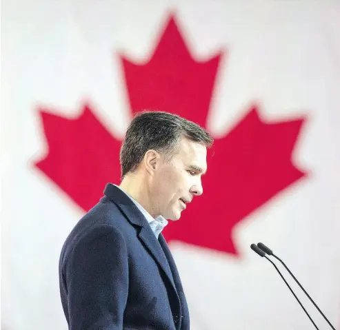  ?? DARREN CALABRESE / THE CANADIAN PRESS FILES ?? Finance Minister Bill Morneau refused to tell the Commons Standing Committee on the Status of Women on April 30 whether the government had done a gender-based analysis on the carbon tax, writes the Post’s John Robson.