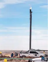  ??  ?? Workers install a new pipeline west of Jal. The highly productive Delaware Basin has made New Mexico the nation’s third-largest oil producing state.