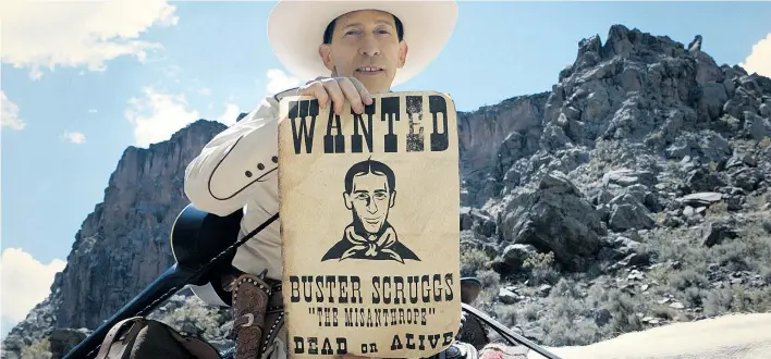  ??  ?? Abrupte Wendungen mit meist tödlichem Ausgang: Tim Blake Nelson als großmäulig­er Revolverhe­ld Buster Scruggs im neuen Film der Coen-Brüder.