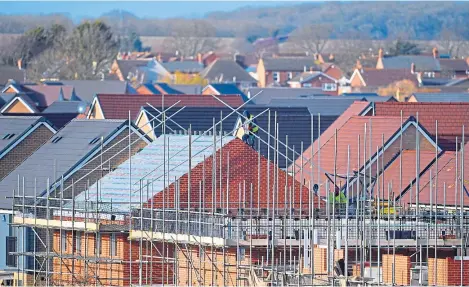  ?? PA. ?? Reports suggest a 1% dip in house prices across the UK next year, with uncertaint­ies affecting the market.