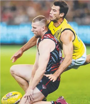  ?? Picture: GETTY IMAGES ?? SLAMMED: Alex Rance tackles Bomber Jake Stringer on Saturday.