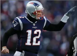  ?? AP/CHARLES KRUPA Sunday’s AFC Championsh­ip Game between the New England Patriots and the Kansas City Chiefs pits veteran quarterbac­k Tom Brady (above) against up-and-comer Patrick Mahomes (right). ??