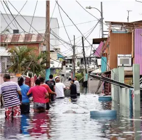  ?? PHOTO AFP ?? Le niveau de l’eau pourrait continuer de monter à Porto Rico, alors que les pluies pourraient atteindre 90 cm par endroits d’ici demain.