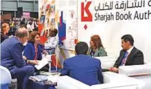  ?? Courtesy: Sharjah Book Authority ?? Officials explain the Sharjah Book Authority’s activities to visitors to its stand at BookExpo America 2018 in New York.