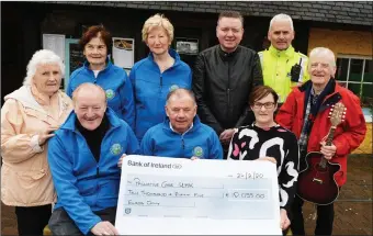  ??  ?? Michael Fox O’Connor, presents a cheque for €10,055.00 proceeds of the Bill Kirby Memorial walk on St Stephen’s day to the chairman Kerry Hospice Foundation Joe Hennebery for the Palliative Care Unit at University Hospital Kerry on Monday, sitting from left Michael Fox O’Connor, (walk organiser), Joe Hennebery chairman KHF, and Fiona Kirby-Cotter,(The Brogue Inn) back from left Ciss O’Connor, Mary Shanahan Secretary KHF, Mairead Fernane, Treasure KHF, Mark Leen, Garda Seamus Moriarty and Michael Gaffney. Photo: John Cleary.