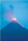  ??  ?? The volcano west of Guatemala City exploded on Sunday, sending clouds of ash miles into the air.