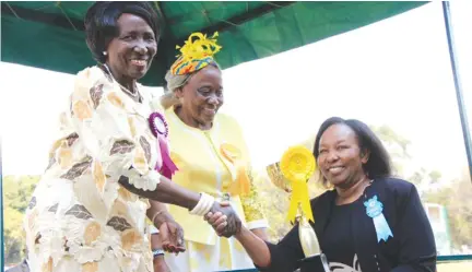  ??  ?? Zambia’s Vice President Inonge Wina (left) hands over Best Internatio­nal Exhibit award to ZimTrade export promotion manager, Mrs Vuyiswa Mafu, at the just ended Zambia Agricultur­al and Commercial Show, in Lusaka