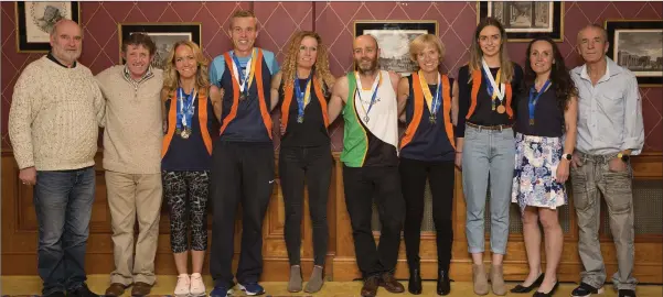  ??  ?? Slí Cualann marathon athletes receive their medals: Cyril Smyth, Bill Porter, Catherine O’Connor, Ian McGrath, Aisling Kirwan, Brian Gurrin, Jean O’Kennedy, Lynn Duffy, Carol Costello, and Terry Kavanagh at the glenview Hotel. Photos: Barbara Flynn