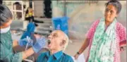  ?? SATISH BATE/HT PHOTO ?? A BMC health worker collects swab sample at Kherwadi BMC Hospital on Wednesday.