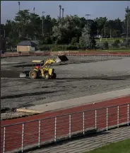  ?? Alex McIntyre / Greeley Tribune ?? Crews work to prepare Nottingham Field for the installati­on of artificial turf grass at the University of Northern Colorado in Greeley July 22. The field was one of only two in the Big Sky Conference still using natural grass as a playing surface.