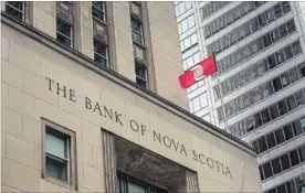  ?? NATHAN DENETTE THE CANADIAN PRESS ?? The Bank of Nova Scotia reported strong first quarter earnings at home and abroad.