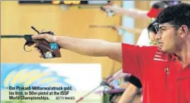  ?? GETTY IMAGES ?? Om Prakash Mitharwal struck gold, his first, in 50m pistol at the ISSF World Championsh­ips.
