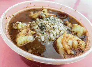  ?? Photos by Chuck Blount / Staff ?? The gumbo with shrimp and loads of sausage slivers is among best in the city.