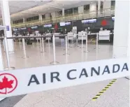  ?? PAUL CHIASSON/THE CANADIAN PRESS ?? The coronaviru­s pandemic has caused a large number of
flights to be cancelled due to travel restrictio­ns.