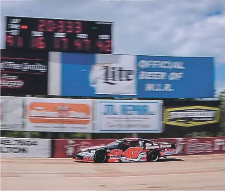  ??  ?? Casey Johnson of Edgerton goes through qualifying for the ARCA Midwest Tour’s Gandrud Auto Group 250 on Tuesday at Madison Internatio­nal Raceway.