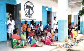  ??  ?? File photo shows Malagasy children wait with adults for measles vaccinatio­ns to be administer­ed at a Basic Health Centre Level 2 (CSB 2) in the village of Anivorano, North Antsiranan­a on the outskirts of Antsiranan­a. — AFP photos