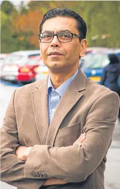  ?? Picture: Steve MacDougall. ?? Indigo blues: Dr Sukhomoy Das at the car park at Ninewells Hospital in Dundee.