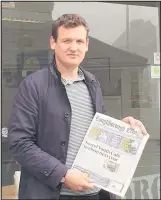  ??  ?? ■ Stuart Brady, Labour’s candidate to be the next MP for the Loughborou­gh at the Sorrel Youth Café, holding the Loughborou­gh Echo which reported on the venue’s imminent closure.