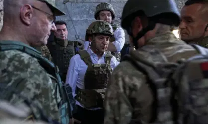  ??  ?? Ukraine’s president Volodymyr Zelenskiy visiting armed forces in the Donetsk region, October 2019. Photograph: Ukrainian Presidenti­al Press Ser/Reuters