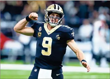  ??  ?? Less than two months before his 40th birthday, quarterbac­k Drew Brees has the Saints on the cusp of the NFC South title, which the team can take a big step toward with a win tonight at Dallas.