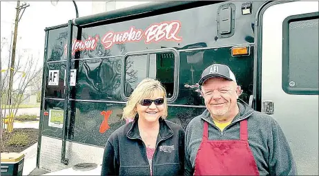  ?? Photo submitted ?? Kristi and Tim Gray spend many of their weekends competing in barbecue contests all over the region.