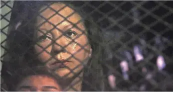  ?? ROB SCHUMACHER, THE ARIZONA REPUBLIC ?? The van carrying Guadalupe Garcia de Rayos of Mesa, Ariz., on her way to deportatio­n Feb. 9 was blocked by protesters in Phoenix, but the mother of two was sent back to Mexico.