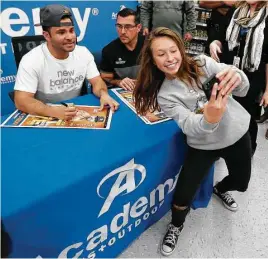  ?? Karen Warren / Houston Chronicle ?? Sarah Saenz, 14, was the last person in line allowed to get Astros MVP Jose Altuve’s autograph at the Academy store Monday in Katy.