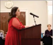  ?? Adam Cook ?? Tunnel Hill resident Vanessa Carroll pleads with Catoosa County officials during the Feb. 18 Board of Commission­er’s meeting to pave Lamoian Drive. Carroll claims the developer of the mobile home community didn’t pave the road as required more than 20 years ago.