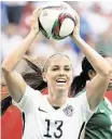  ?? Jonathan Hayward / Associated Press ?? This summer, the spotlight is on Alex Morgan and the U.S. soccer team in the FIFA Women’s World Cup.