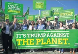  ?? AP FILE ?? Germany’s Green Party protests against Donald Trump's decision to exit the Paris agreement.