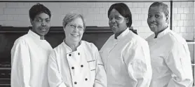  ?? PHOTO BY STEFFI GRAHAM ?? Latitia Carter, left, is a graduate of the BOS culinary arts program, devised by chef Connie Crabtree-Burritt, second from left; also pictured are Michele Gray and Posie Spratley.