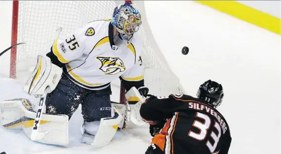  ?? CHRIS CARLSON/THE ASSOCIATED PRESS ?? Anaheim Ducks winger Jakob Silfverber­g, seen taking a shot against Nashville Predators goaltender Pekka Rinne during Game 1 of the Western Conference final on Friday in Anaheim, Calif., was acquired from the Ottawa Senators as part of the deal for...