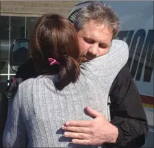  ?? MEDIANEWS GROUP FILE PHOTO ?? Chris Eckman gets a hug from a family friend following the hearing last March for David Matthew Strowhouer, 30, of the Newtown Square section of Willistown, who was charged with homicide by vehicle while driving under the influence, and myriad related offenses following a February accident that killed his wife, Deana, and injured him.