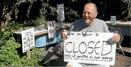  ?? PHOTOS: KEVIN STENT/STUFF ?? Wellington City Council has told Martin Wilson he must remove his worm farm from an Aro Valley bus stop as he does not have permission to use the public land.