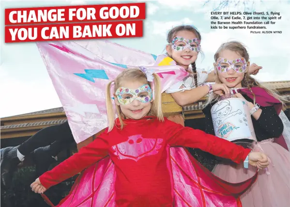  ?? Picture: ALISON WYND ?? EVERY BIT HELPS: Olive (front), 5, flying Ollie, 7, and Eadie, 7, get into the spirit of the Barwon Health Foundation call for kids to be superhero fundraiser­s.