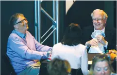  ?? (Rick Wilking/Reuters) ?? BERKSHIRE HATHAWAY CEO Warren Buffett (right) plays Bridge with Microsoft founder Bill Gates during the Berkshire Hathaway annual meeting weekend in Omaha, Nebraska, on May 7.